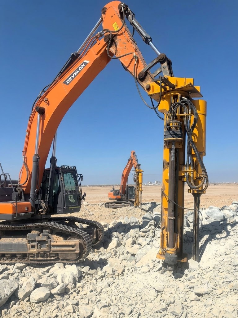 Drill & Split Integrated Machine working at quarry site - mounted on DEVELON excavator for non-explosive rock breaking